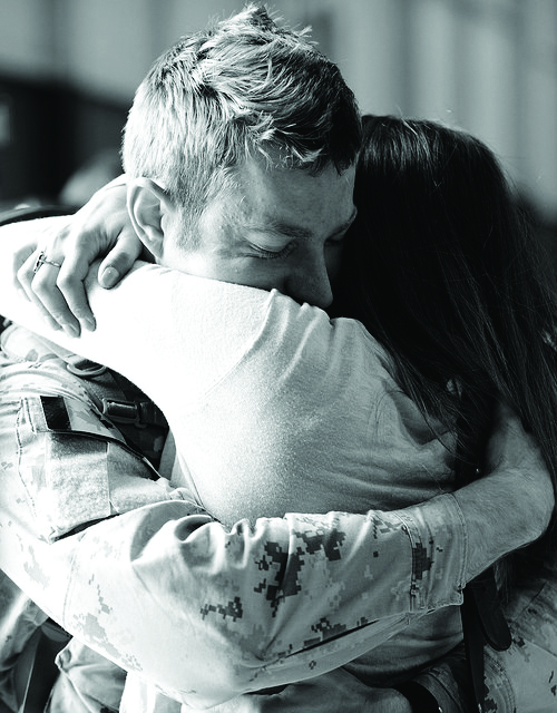 A Soldier embracing his wife