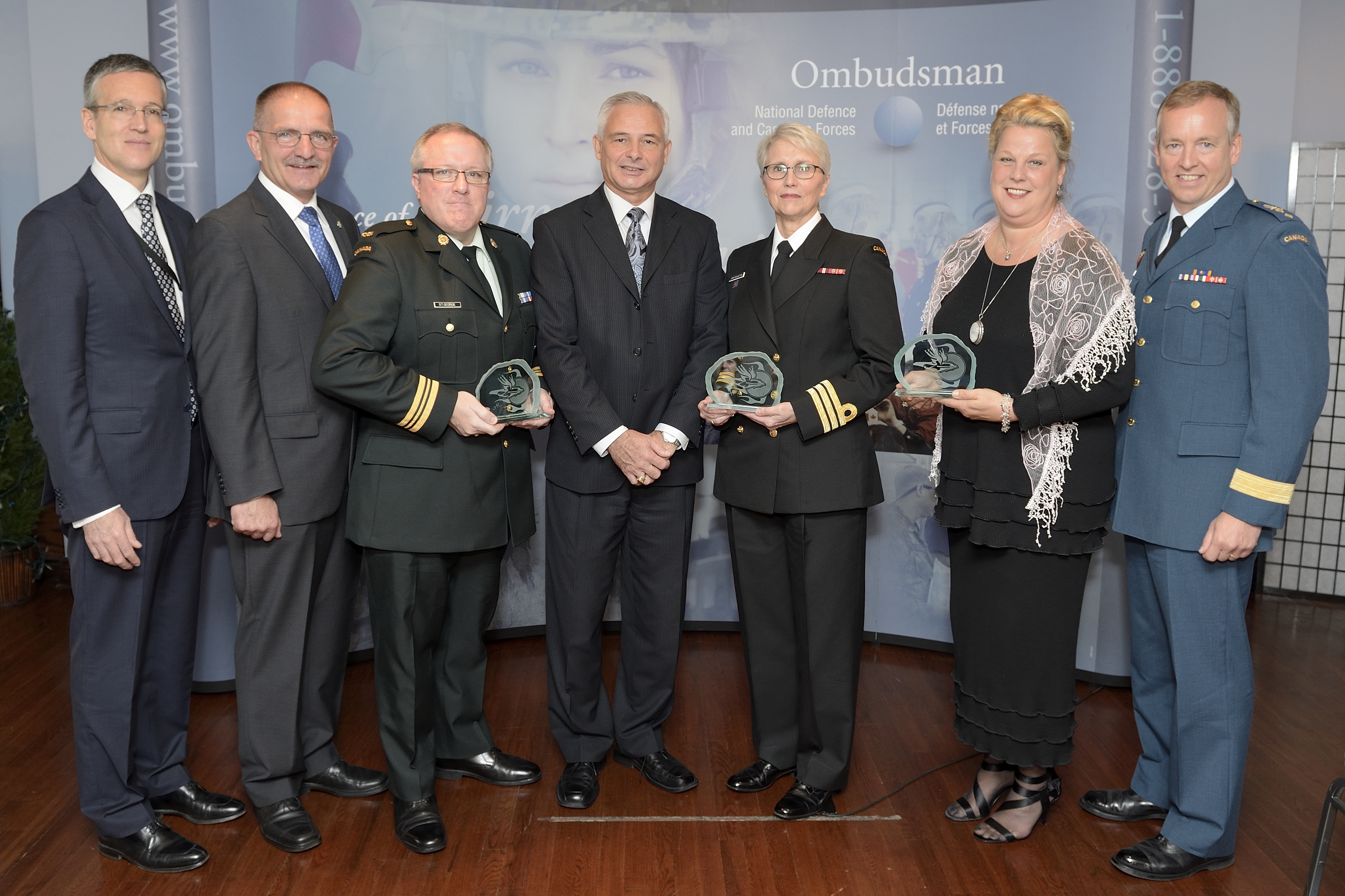 Photo of commendation recipients, the Ombudsman and special guests.